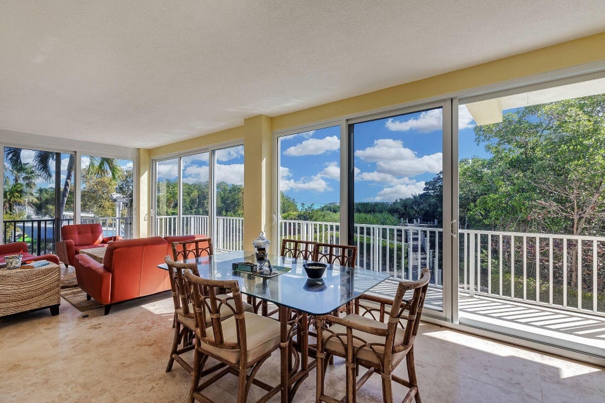Image 3: 3-ENCLOSED WATERSIDE PORCH INCLUDES SITT