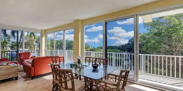 Image 3: 3-ENCLOSED WATERSIDE PORCH INCLUDES SITT