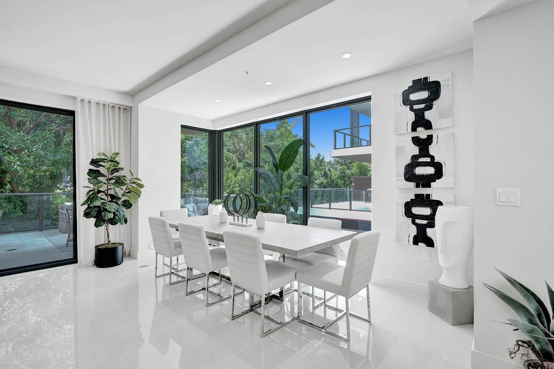 Image 2: Spacious interior featuring pristine white floorin