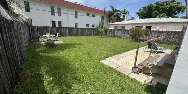Image 4: large fenced in yard, large enough for a pool