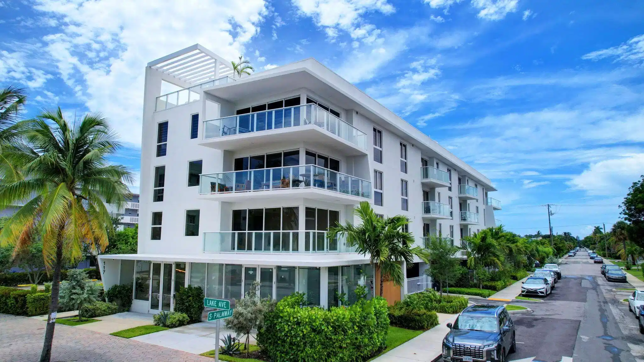 Image 1: Located on the corner of Lake Ave and S Palm Way