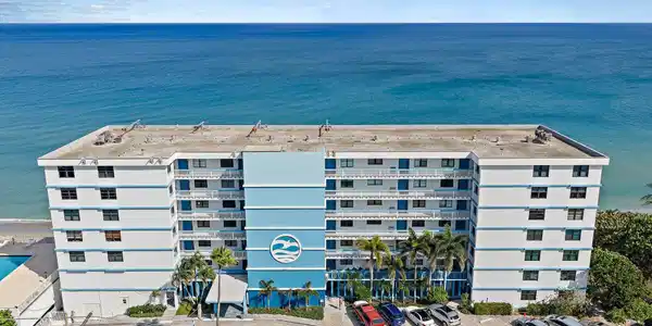 Image 2: Exterior Photo. Directly on the sand.