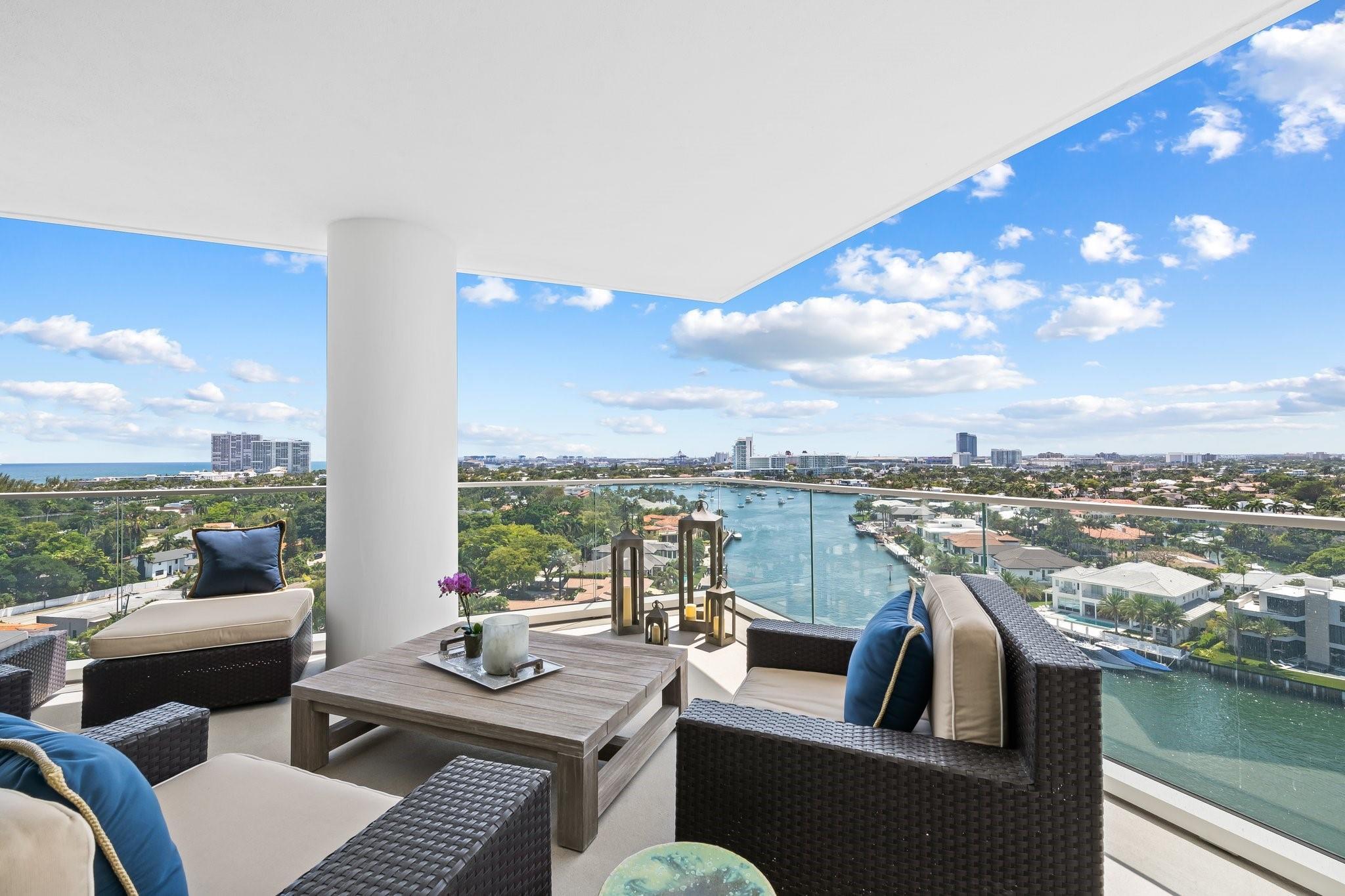 Image 2: Expansive balcony featuring a glass railing, offer