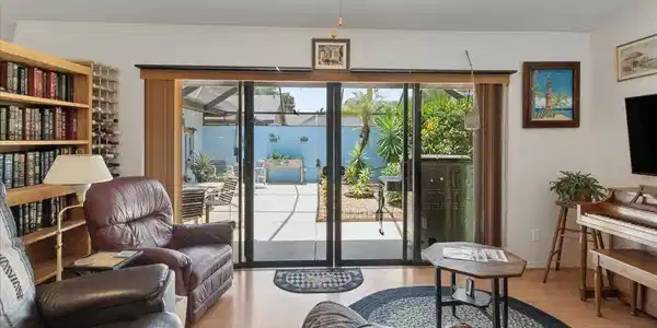 Image 2: Living Room to Screened Patio