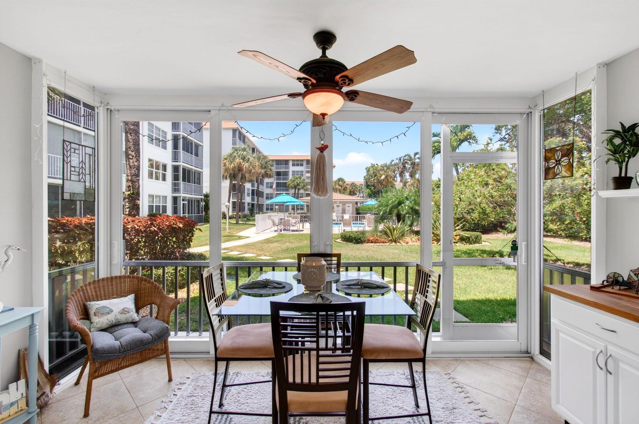 Image 1: Lanai pool & garden views. Bar to entertain.