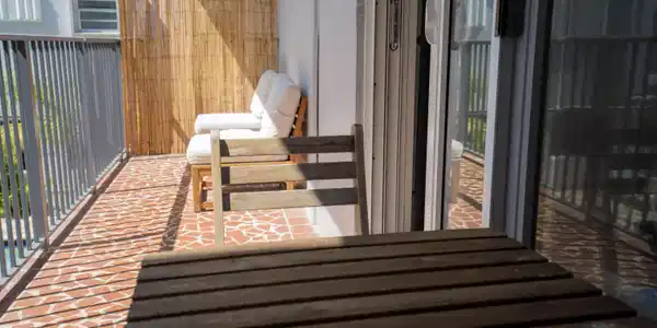Image 2: Outdoor balcony featuring mosaic-style tile floori