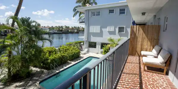 Image 3: Balcony with mosaic tile flooring and metal railin