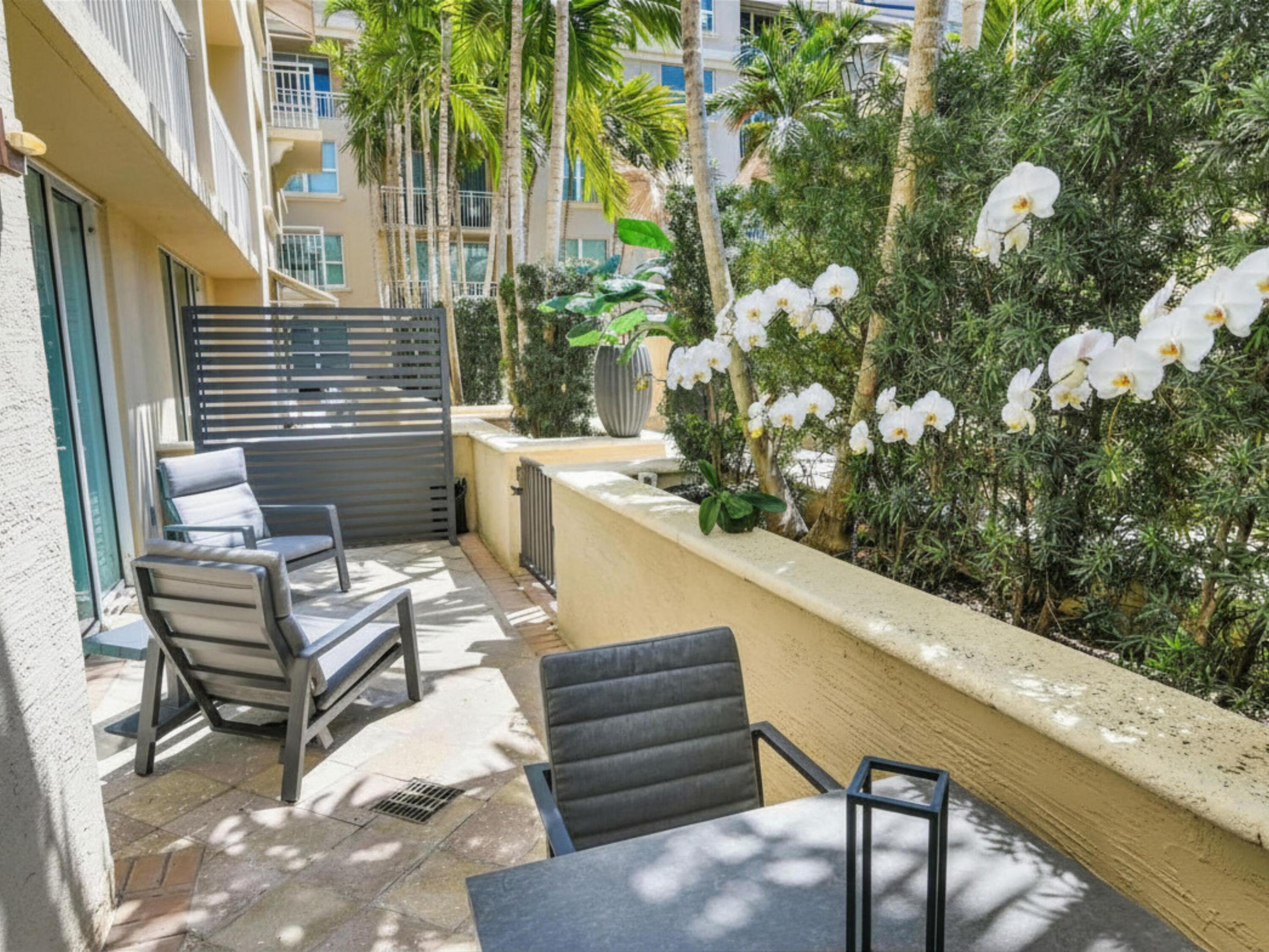 Image 4: Imagine stepping onto your private patio, a serene