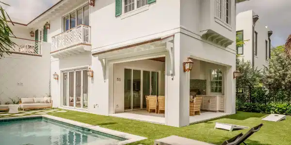 Image 2: 04 - White home exterior with covered pa
