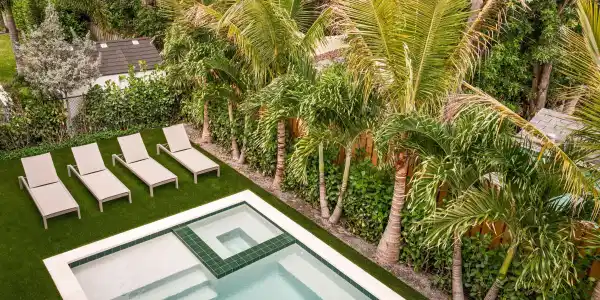 Image 4: 07 - Backyard pool with green tile accen