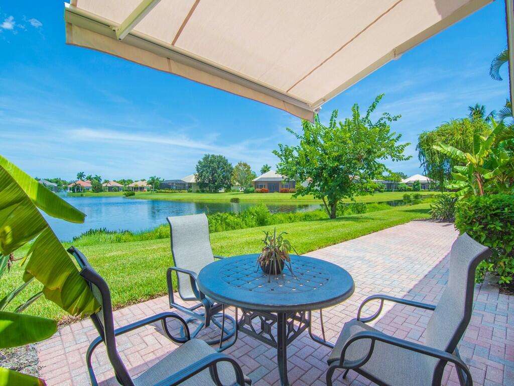 Image 3: BACK PATIO WITH COVERED AWNING TO ENJOY YOUR LAKE