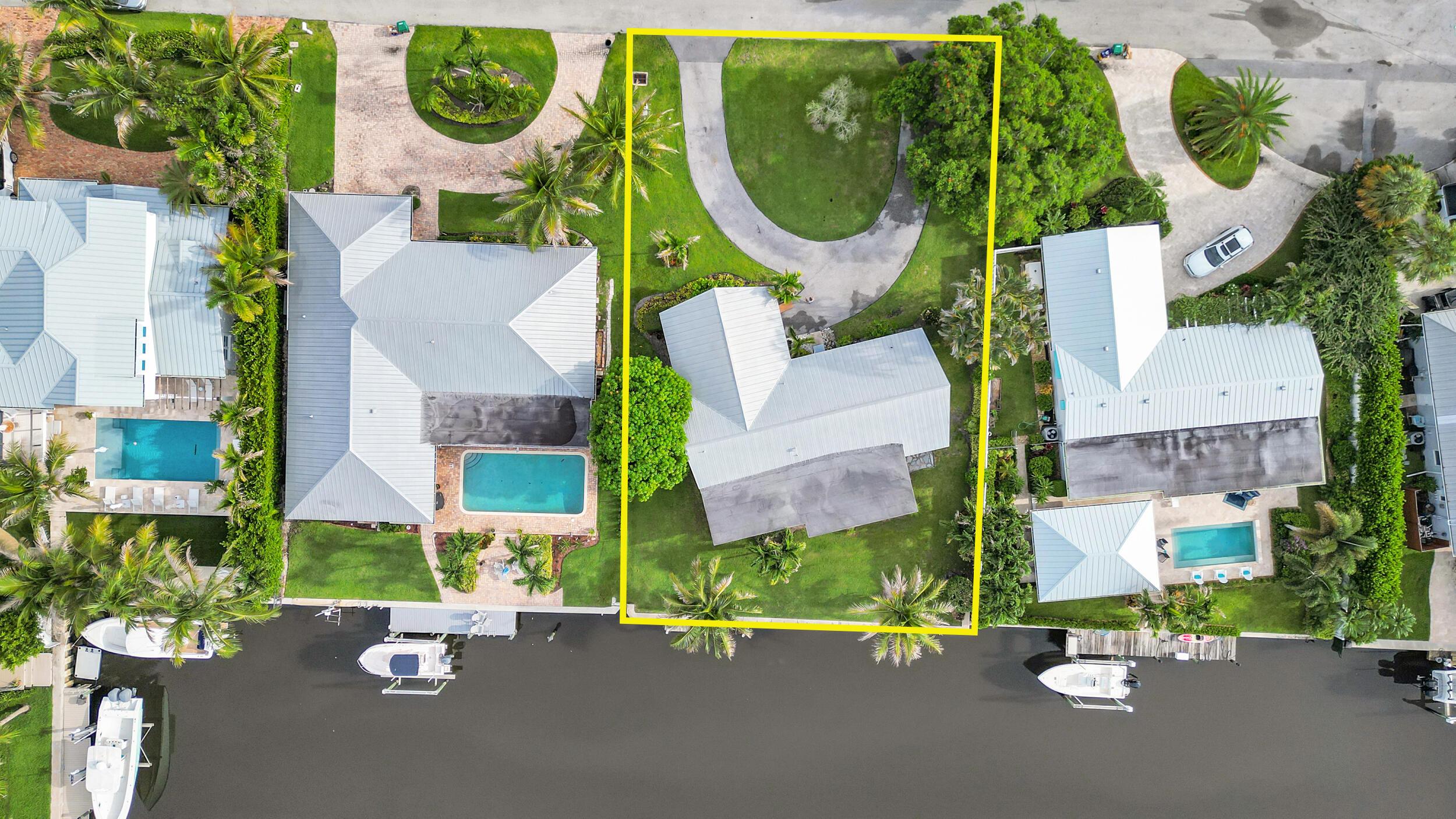 Image 1: Waterfront estate featuring three residences with