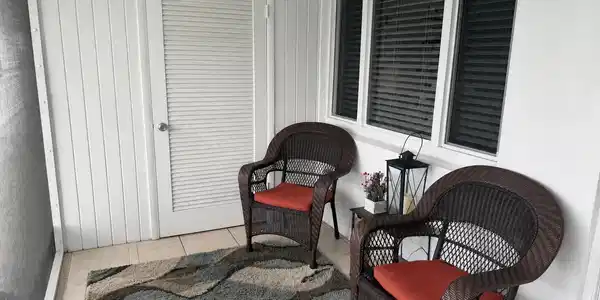 Image 2: Screened porch over looking the water