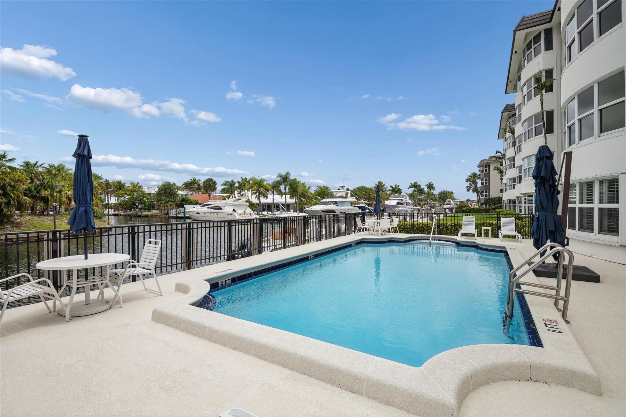Image 3: Waterfront pool area overlooking the canal&mdash;perfect