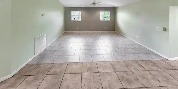 Image 3: Spacious room featuring vaulted ceilings, recessed