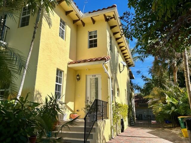 Image 3: Front and party entry to garage