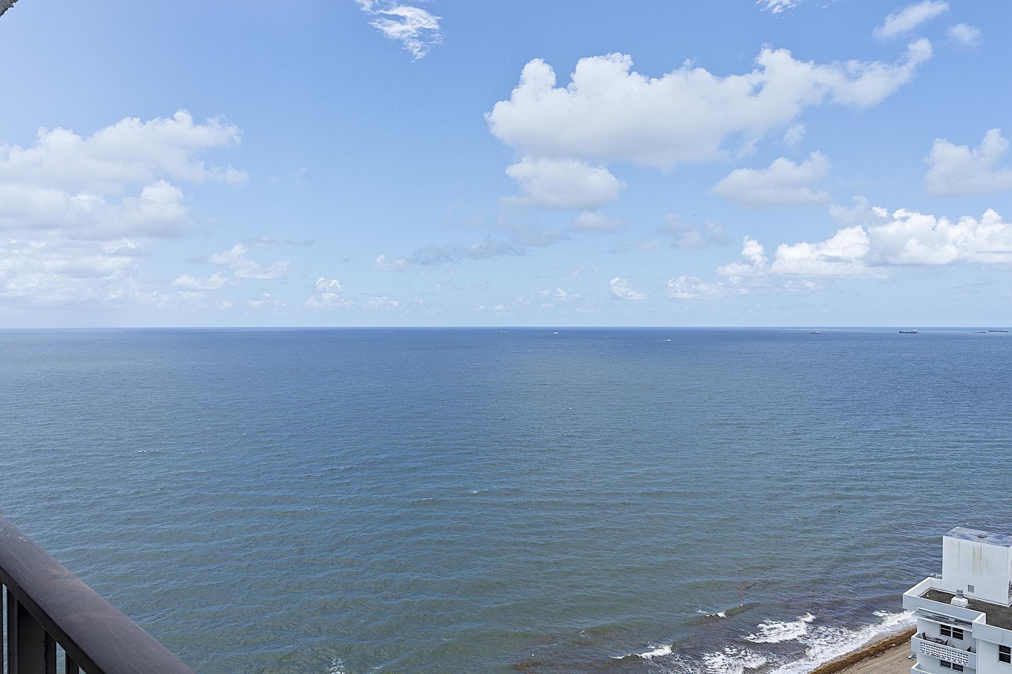 Image 3: Expansive Southeast Ocean View from large balcony
