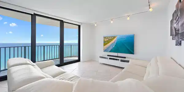 Image 4: Enjoy watching TV and seeing the boats go by from