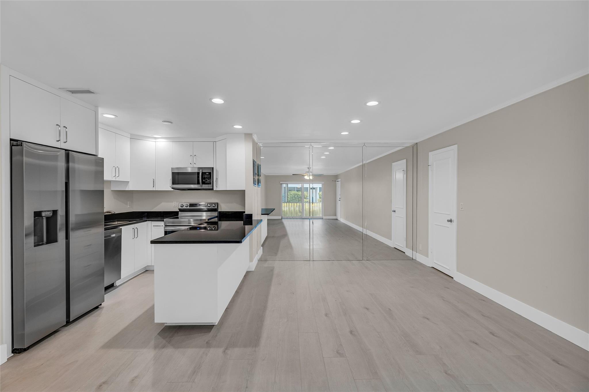 Image 4: Dining area with large pantry closet