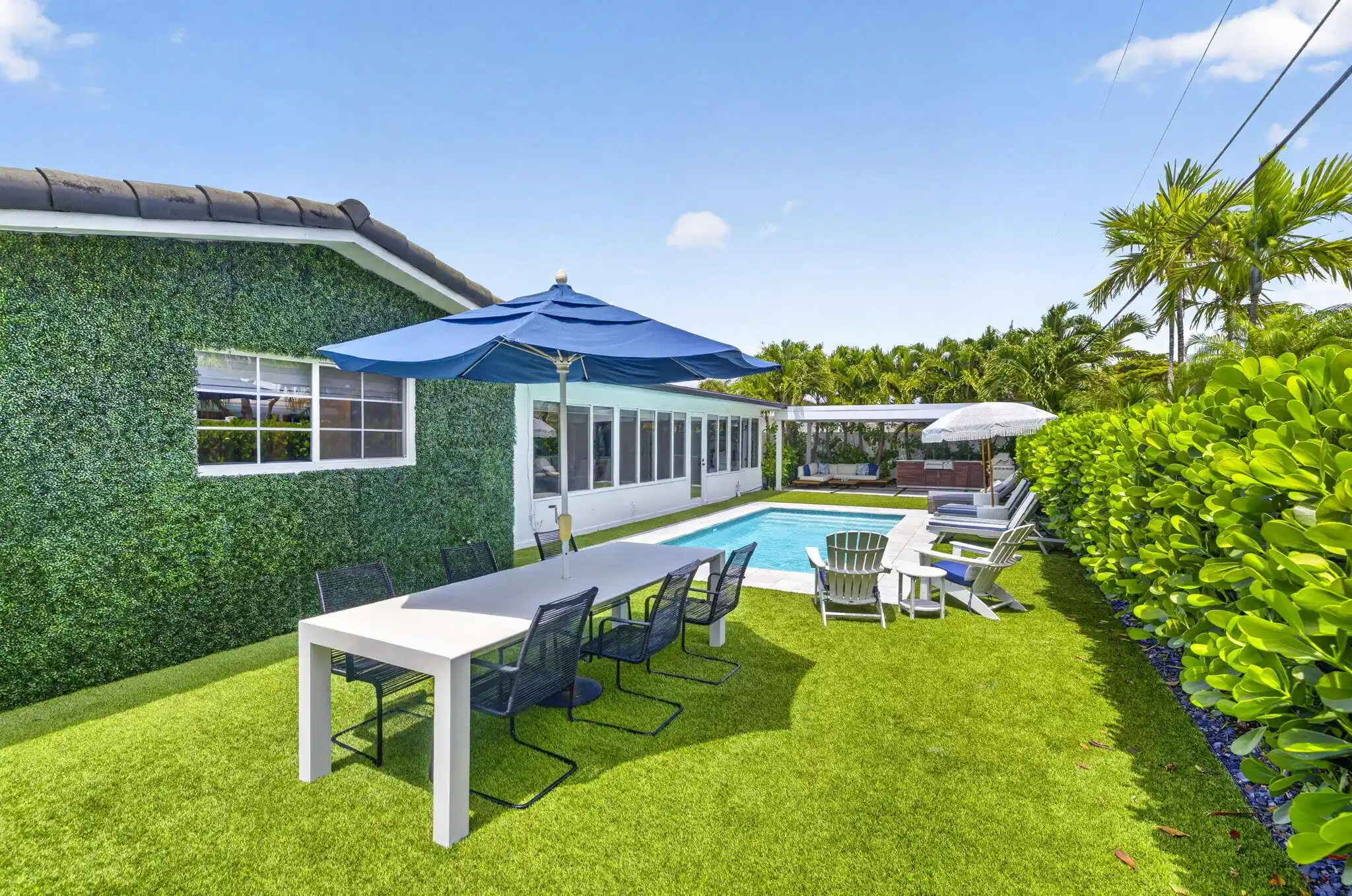 Image 1: Inviting backyard with pool and summer kitchen!