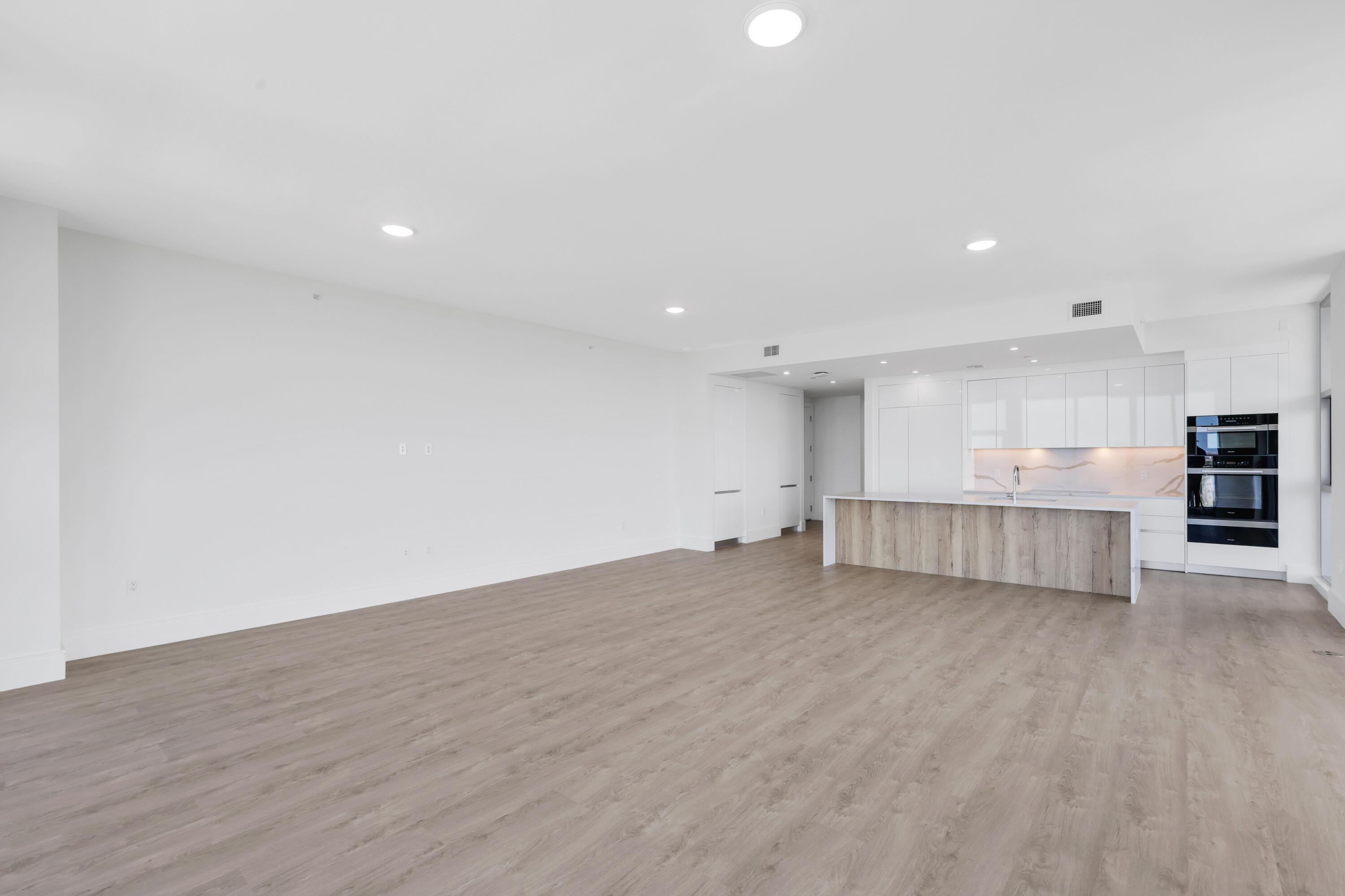 Image 4: side view of great room and kitchen