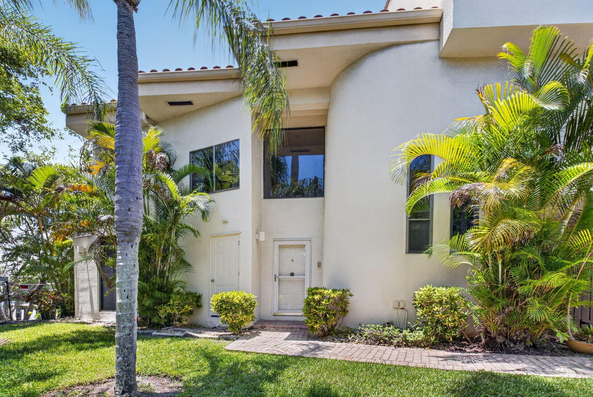 Image 2: Corner unit townhome with private front entry