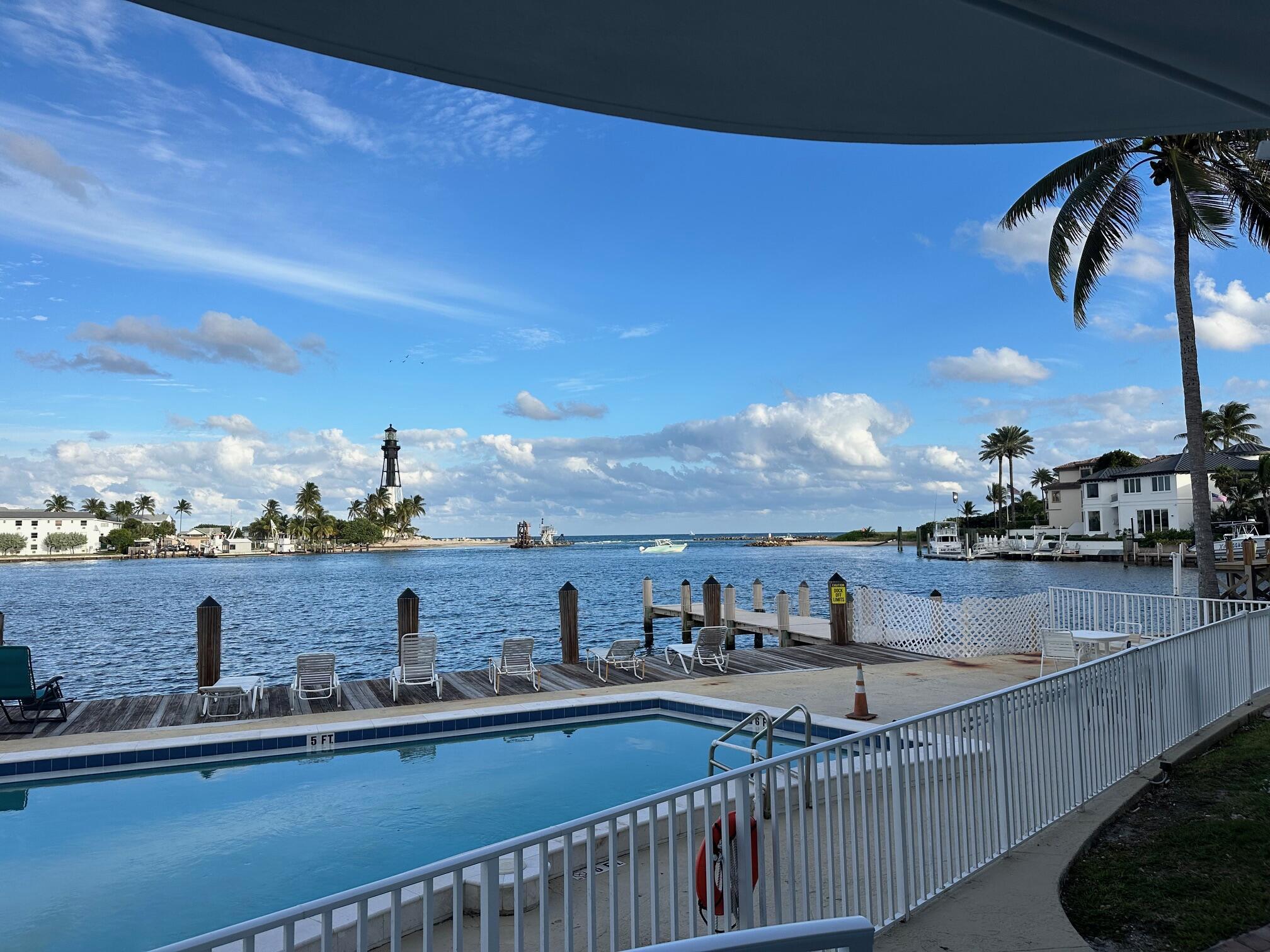 Image 1: Waterfront View from Balcony: Enjoy sweeping water