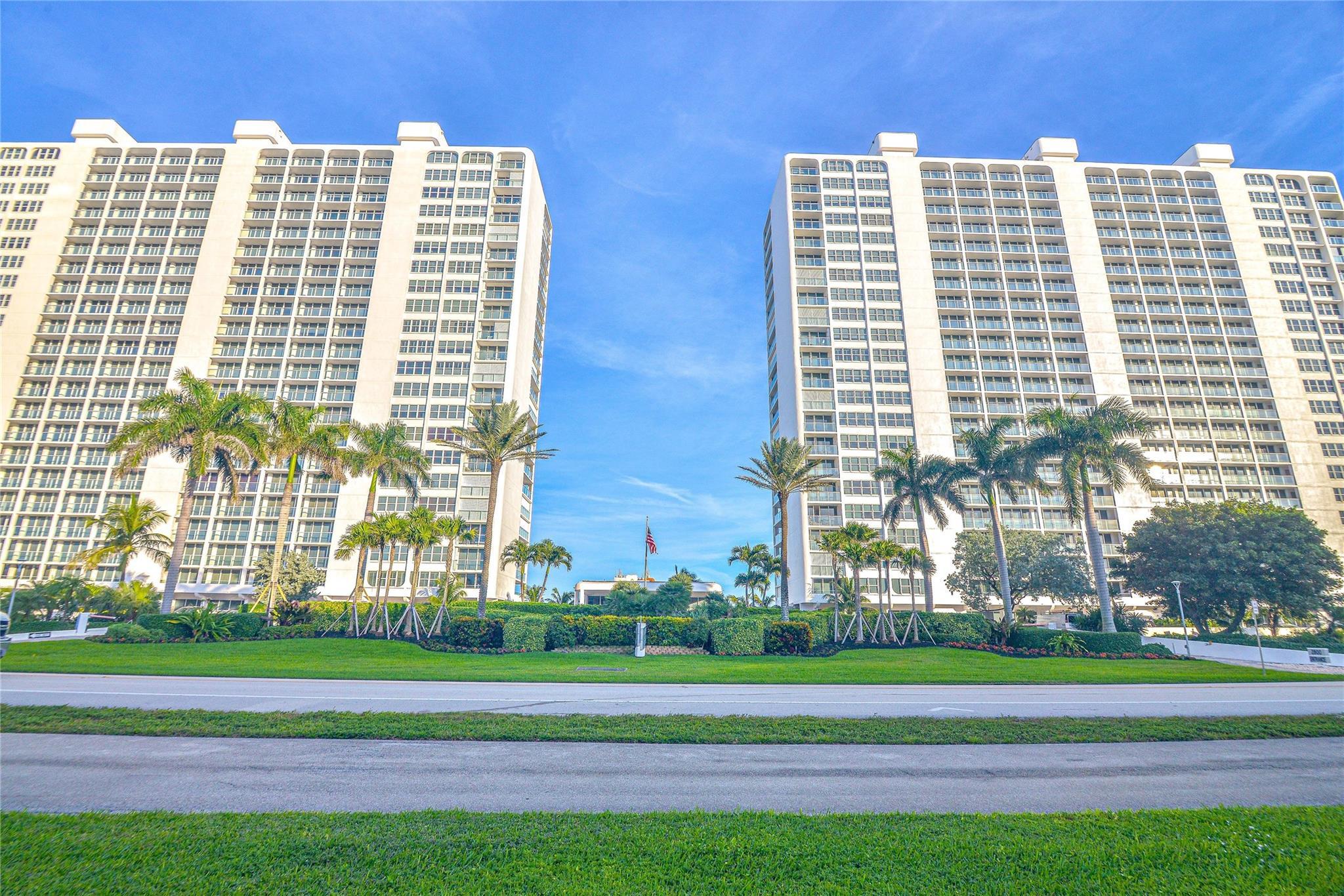 Image 2: Twin high-rise structures featuring extensive balc