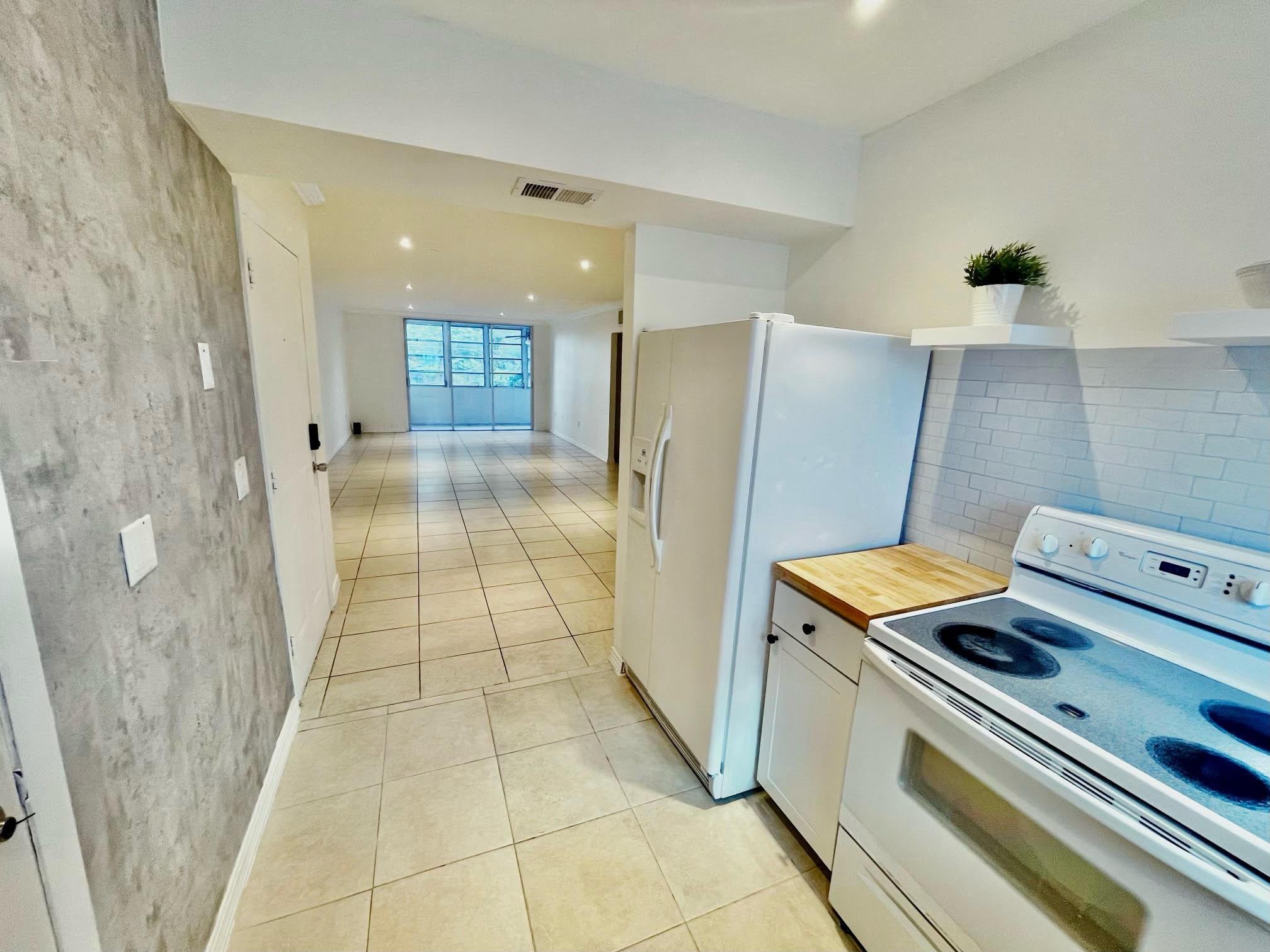 Image 1: Kitchen + Living Rm
