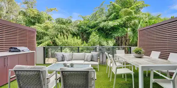 Image 3: large terrace provides a backyard atmosphere