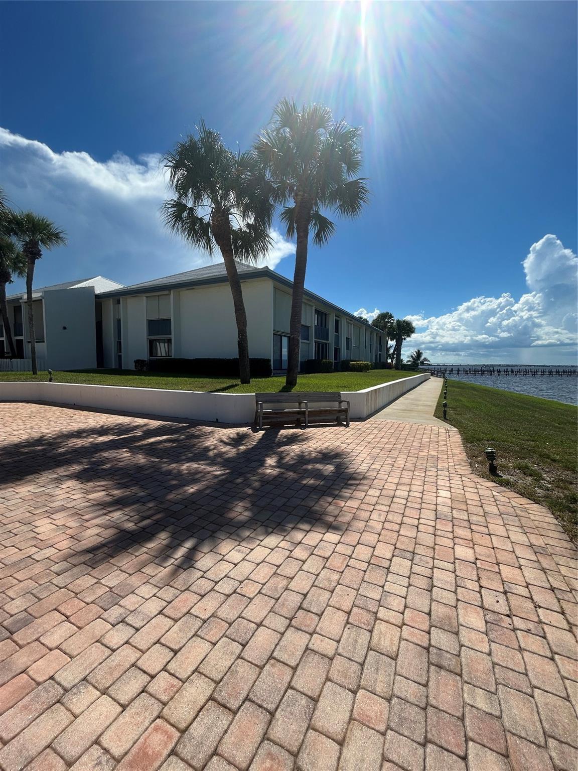 Image 4: View of building from the club house/ pool/ and lo