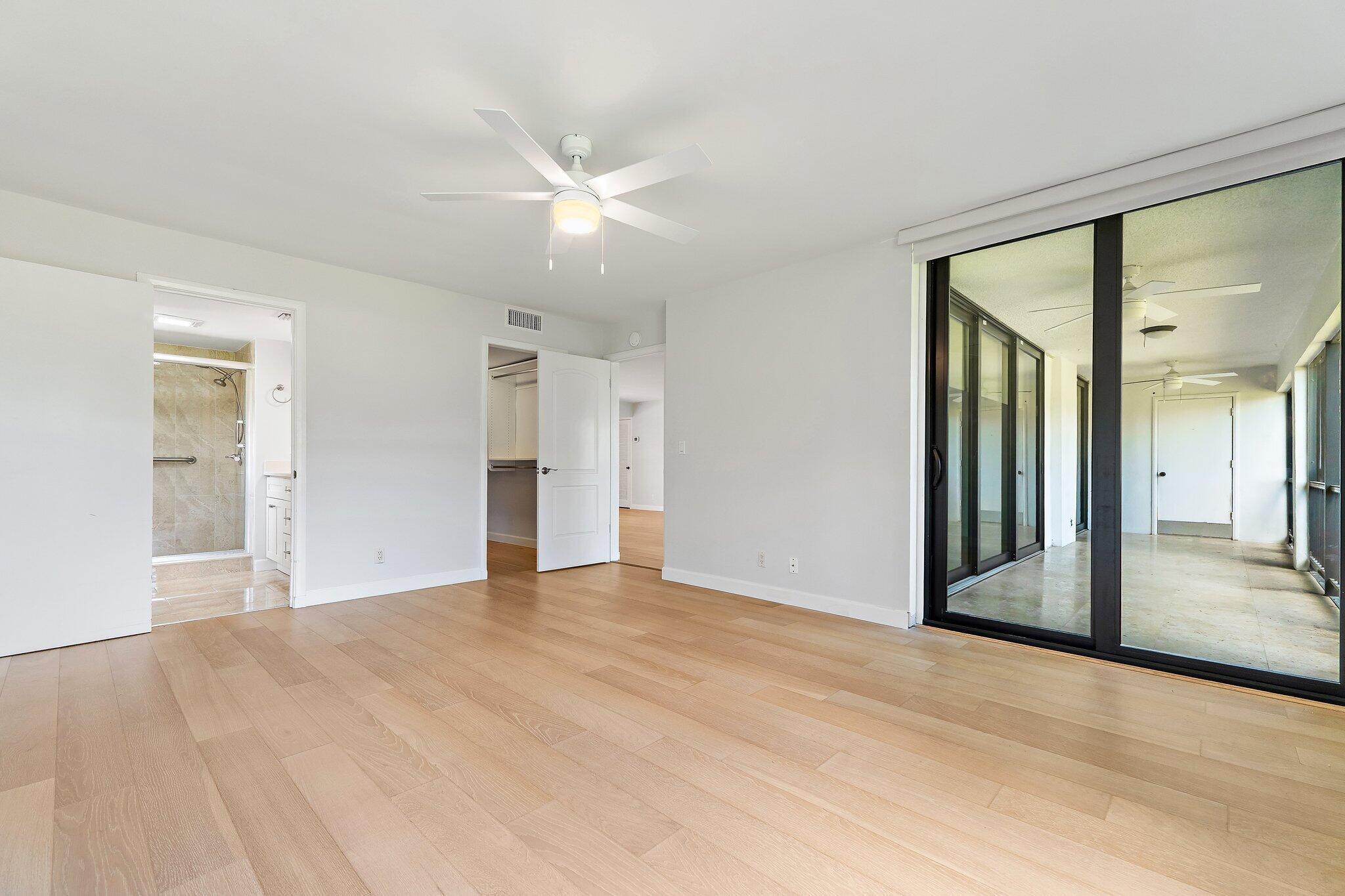 Image 4: Spacious great room opens to the screened patio an