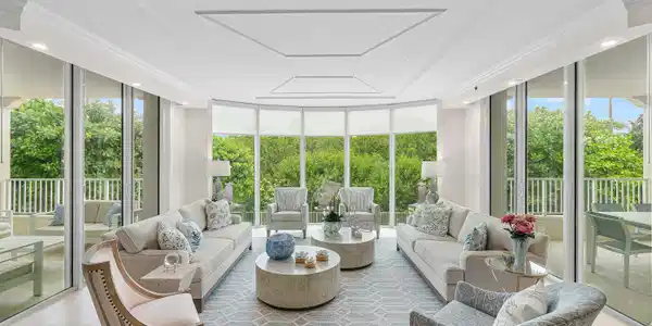 Image 2: WALLS OF IMPACT GLASS AND VIEWS OF LUSHLY LANDSCAP