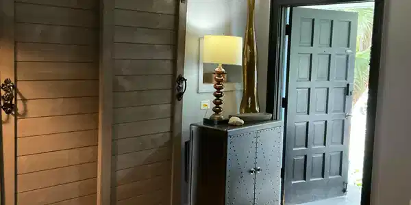 Image 2: Natural wood-finish plank ceiling with crown moldi
