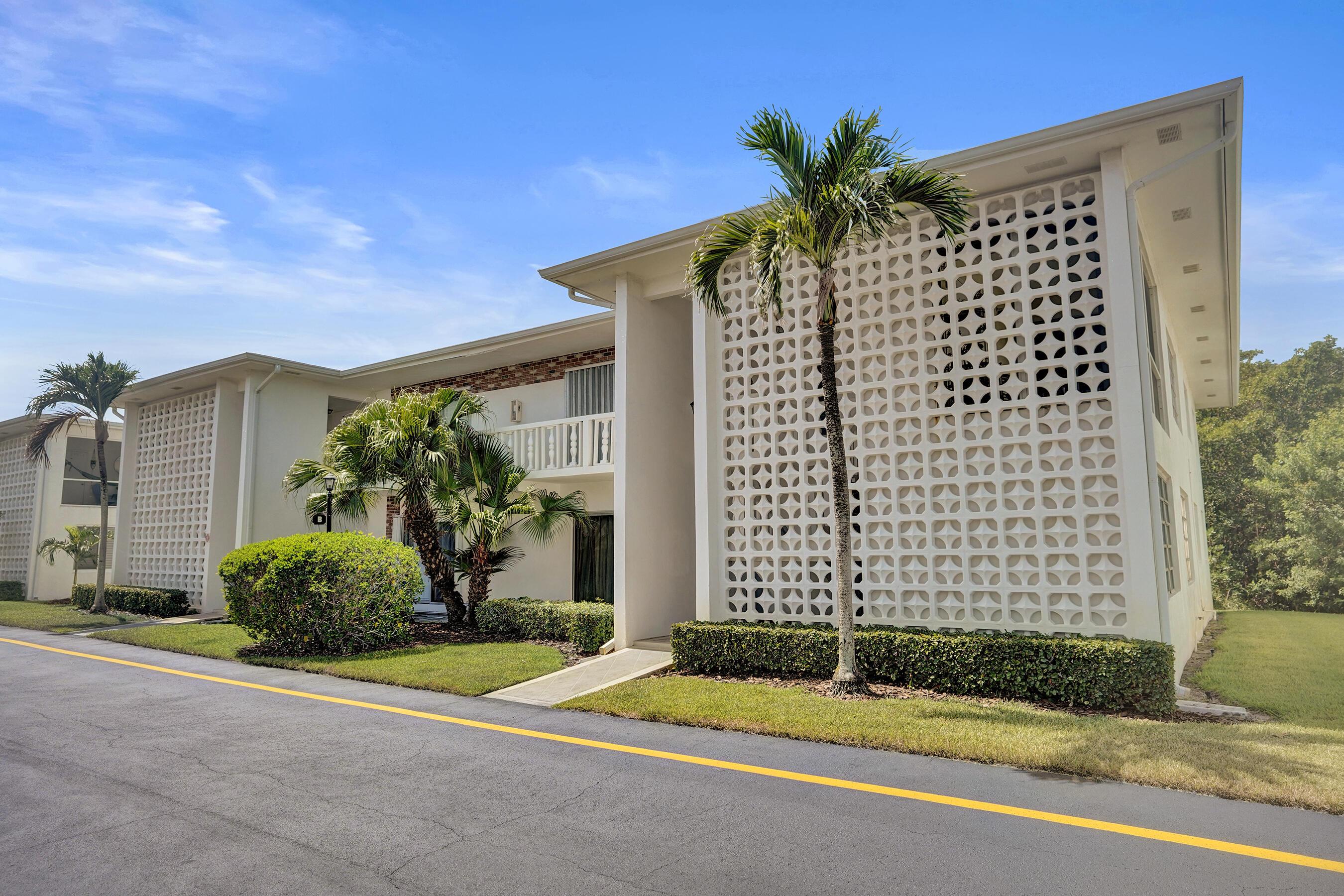Image 1: Mid-century modern building featuring decorative c