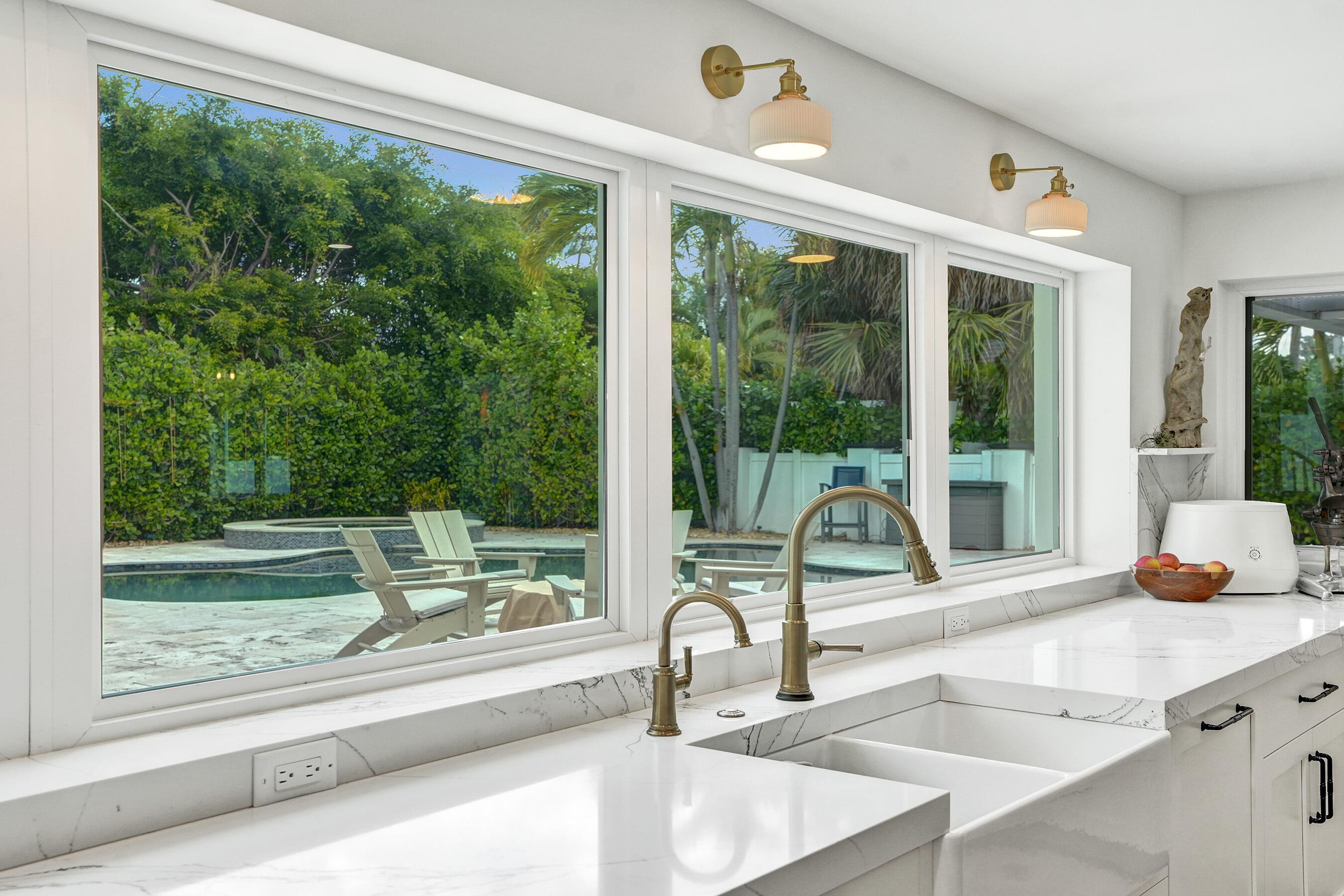 Image 3: KITCHEN WINDOW VIEW POOL