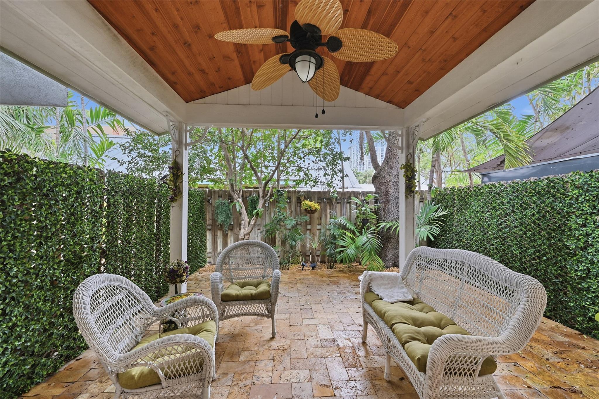 Image 3: Covered private patio creates the perfect outdoor