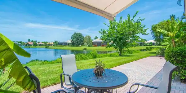 Image 3: BACK PATIO WITH COVERED AWNING TO ENJOY YOUR LAKE