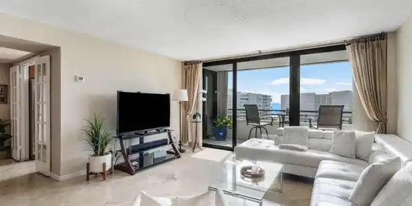 Image 3: Living area with large format tile flooring and ex