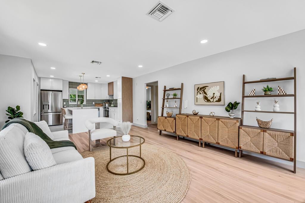 Image 2: liv room with hardwood floors