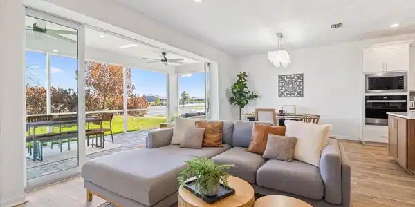 Image 4: Living Room w/ Open Sliders View