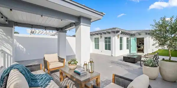 Image 3: Rooftop with staged furniture for perspective.