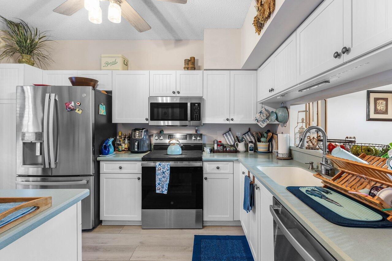 Image 3: Kitchen newer SS appliances
