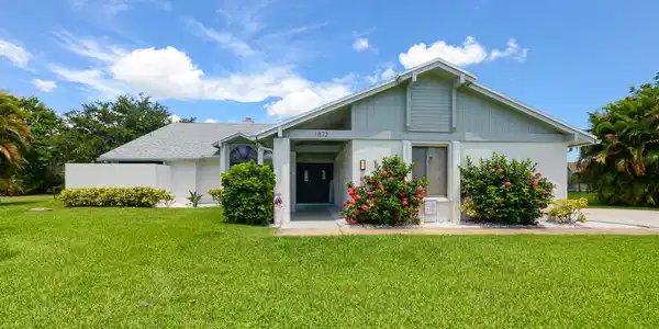 Image 2: Ranch-style residence featuring a prominent gable