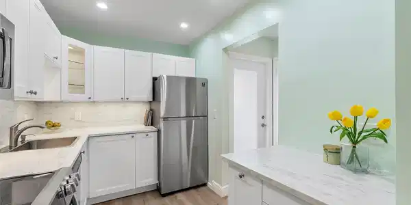 Image 3: View of the Kitchen from the dinning area.