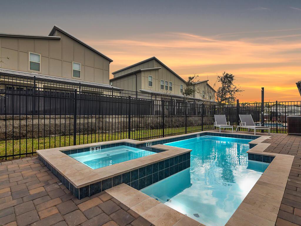 Image 2: Pool Sunset View. Heated with Jacuzzi and Paver De