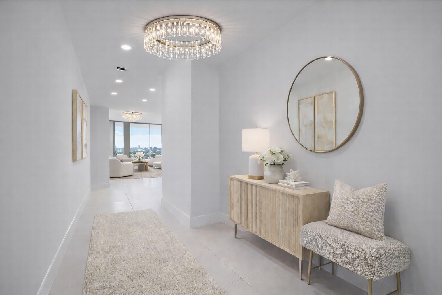 Image 2: The entryway of the condo, chandelier not included