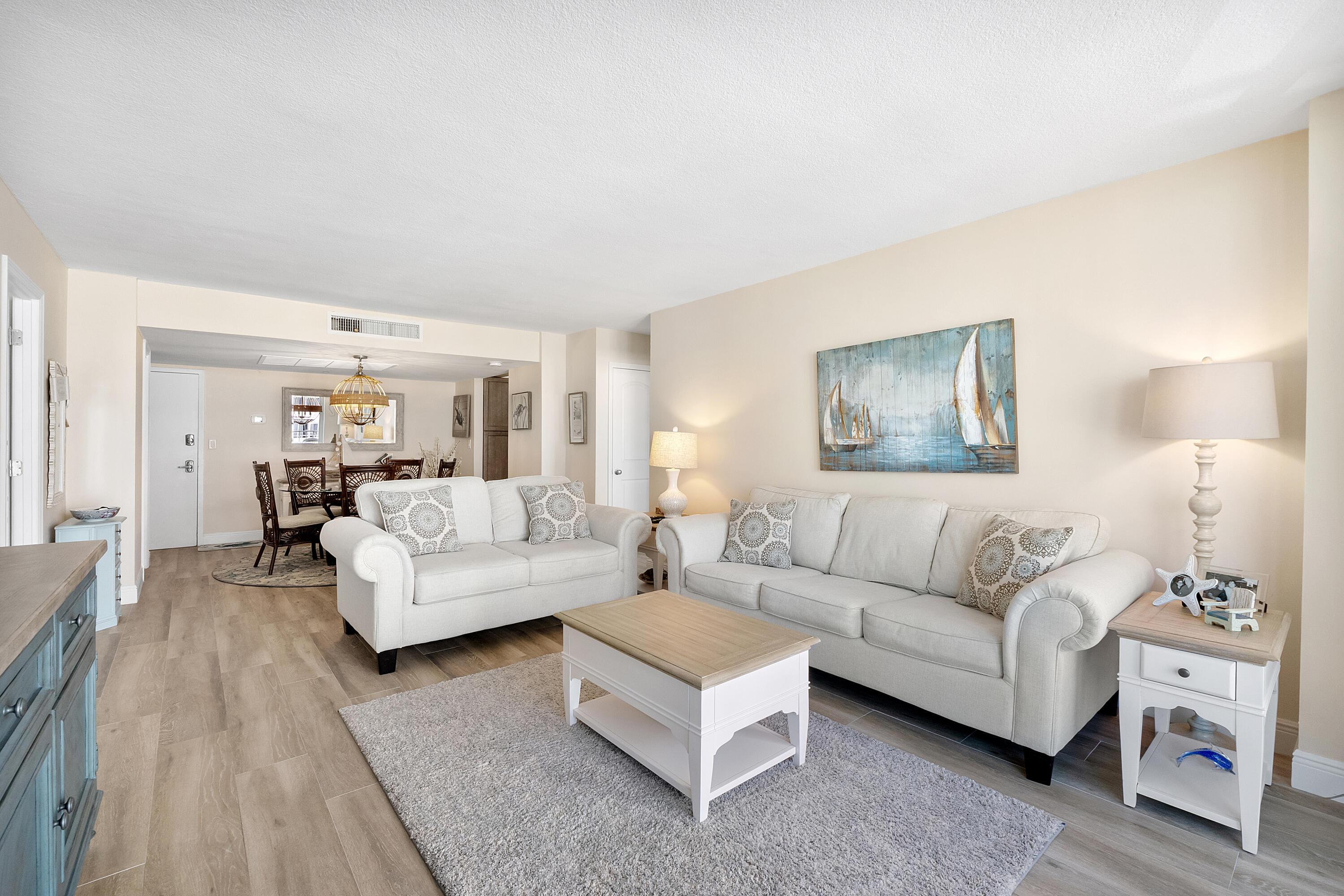 Image 3: Living area and dining room