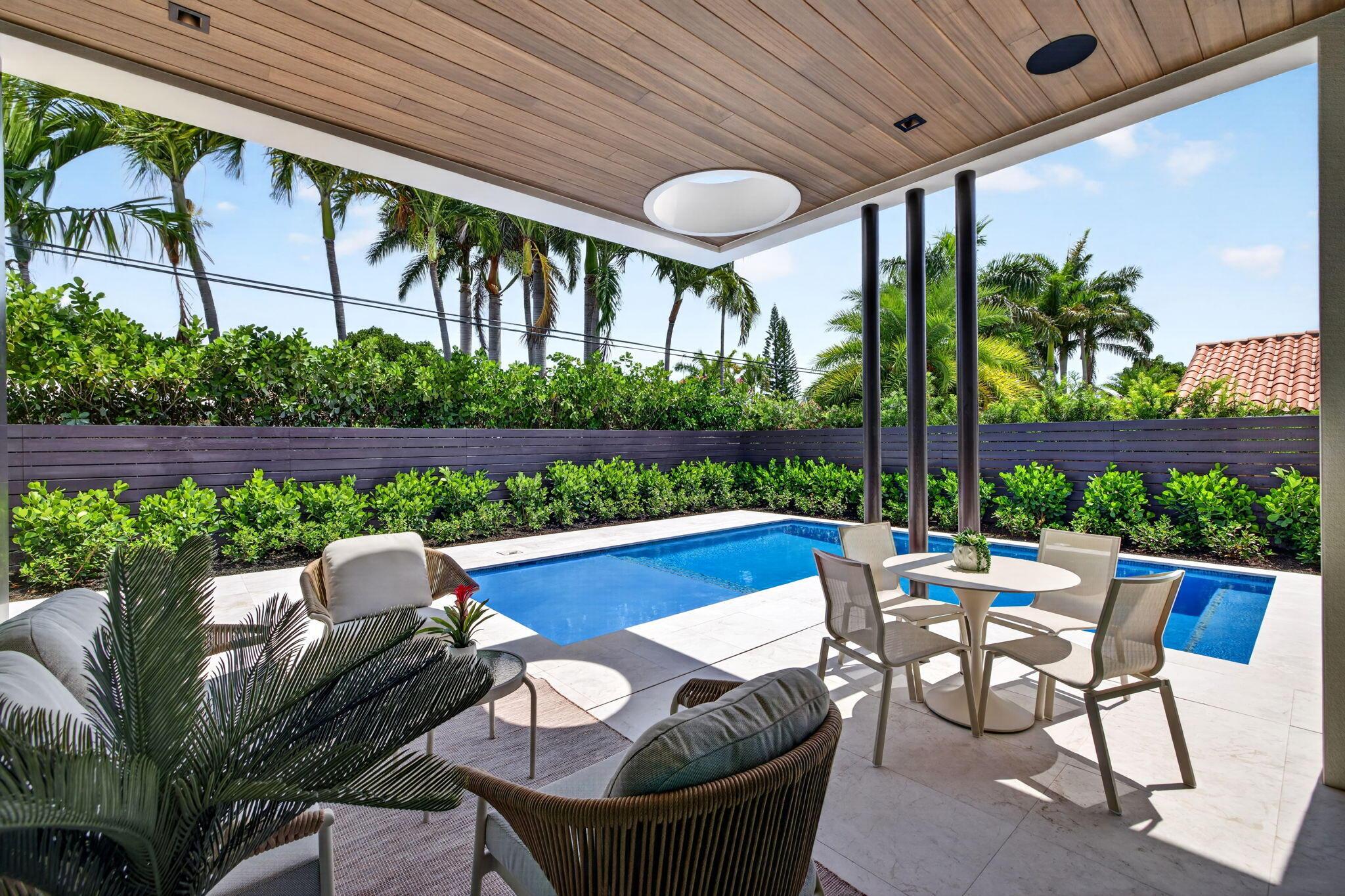 Image 4: The outdoor living areas are designed for relaxed