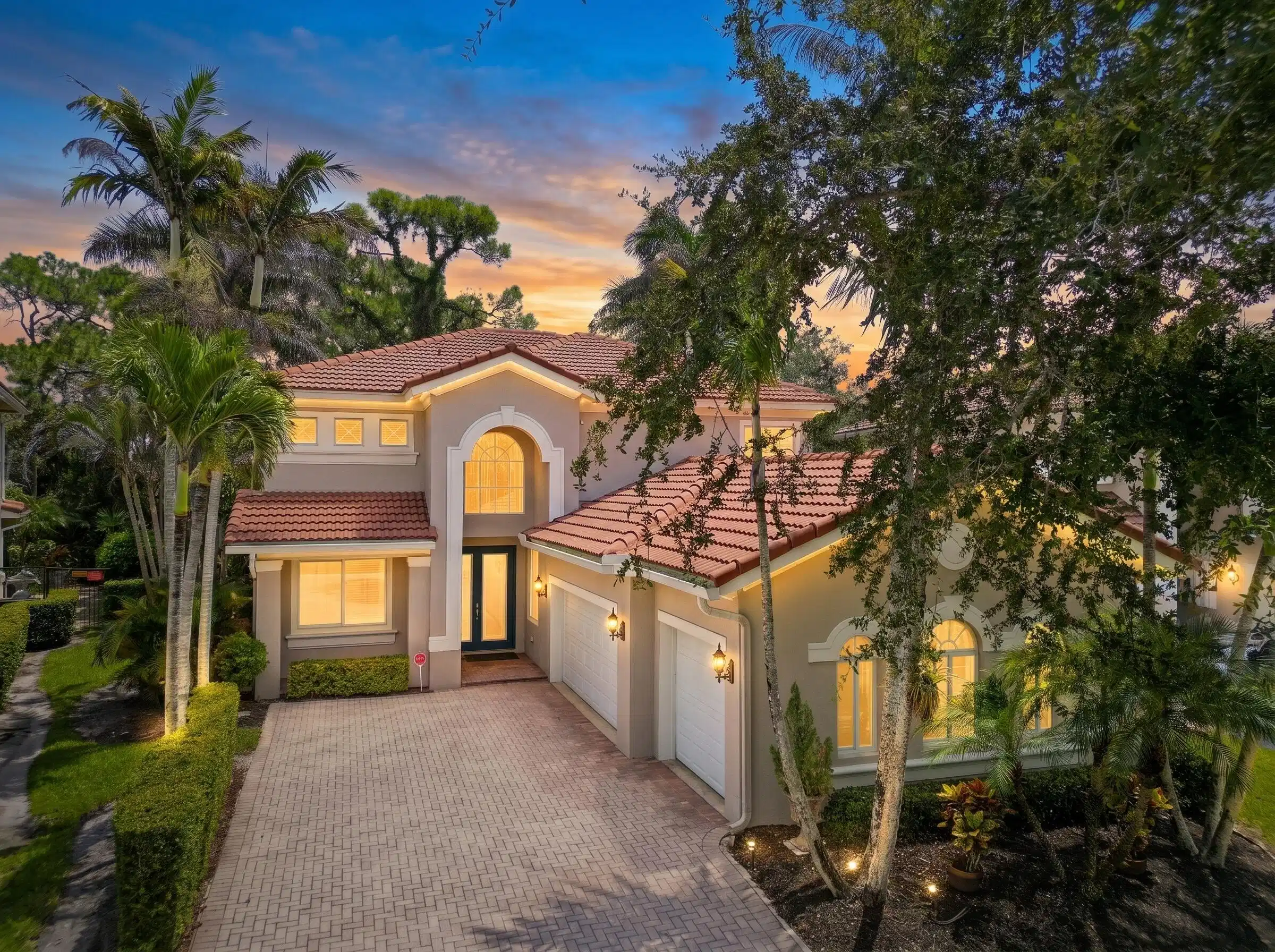 Image 1: Front of home with evening AI enhancement